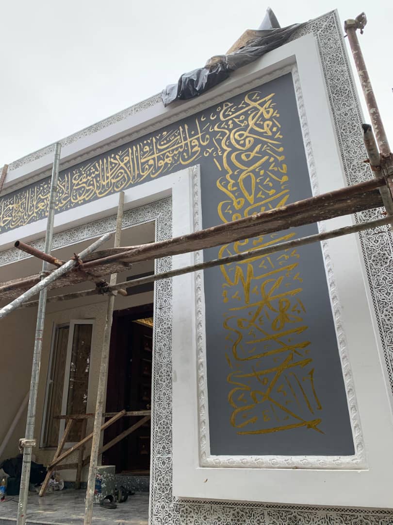 Facade with decorative gold lattice