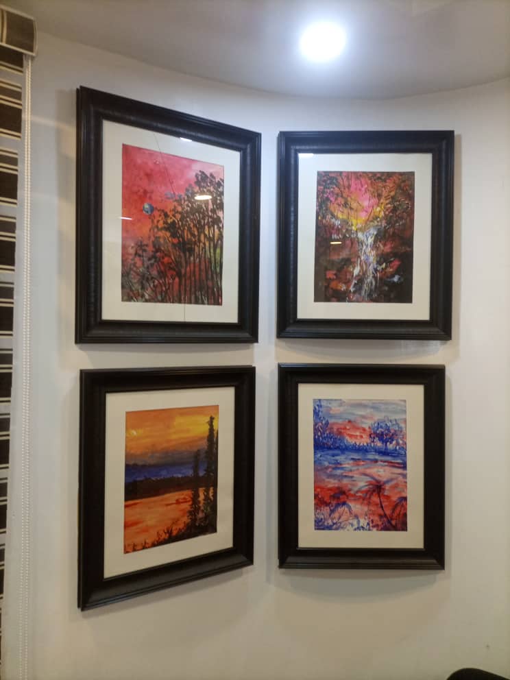 Four framed art prints