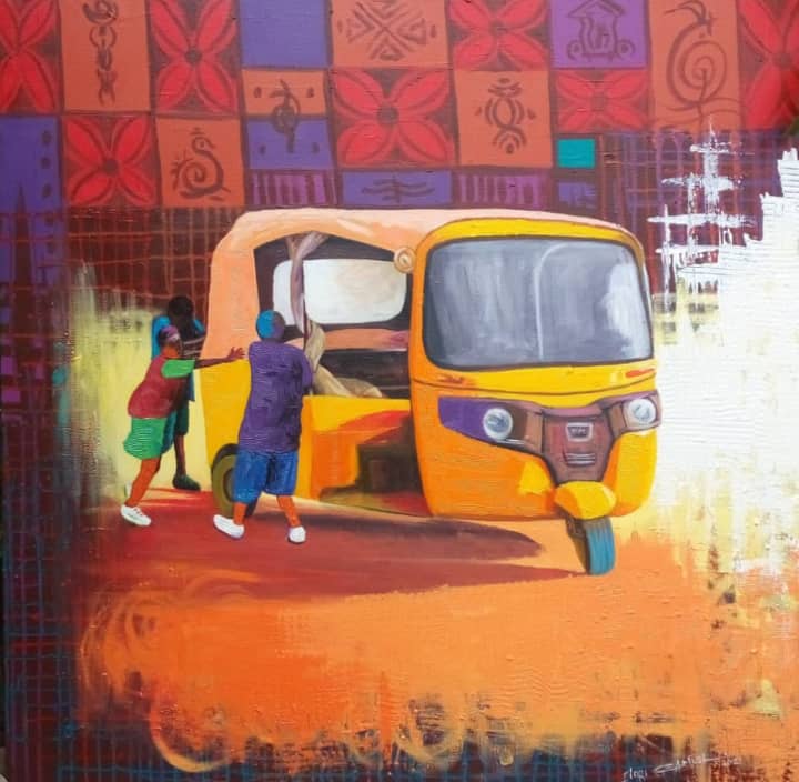 Yellow tricycle in a busy market street
