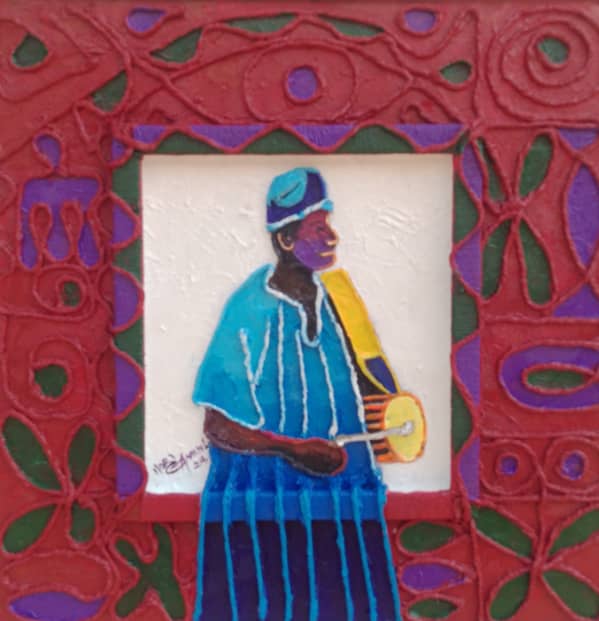 Man in blue agbada in a red frame