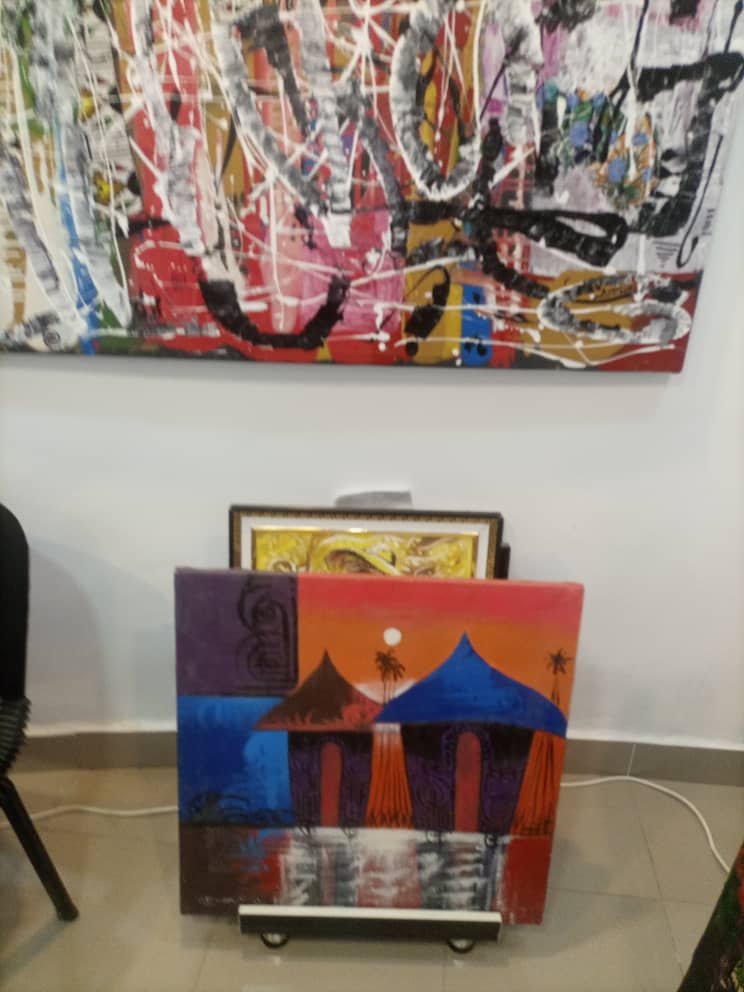 Paintings displayed in the showroom
