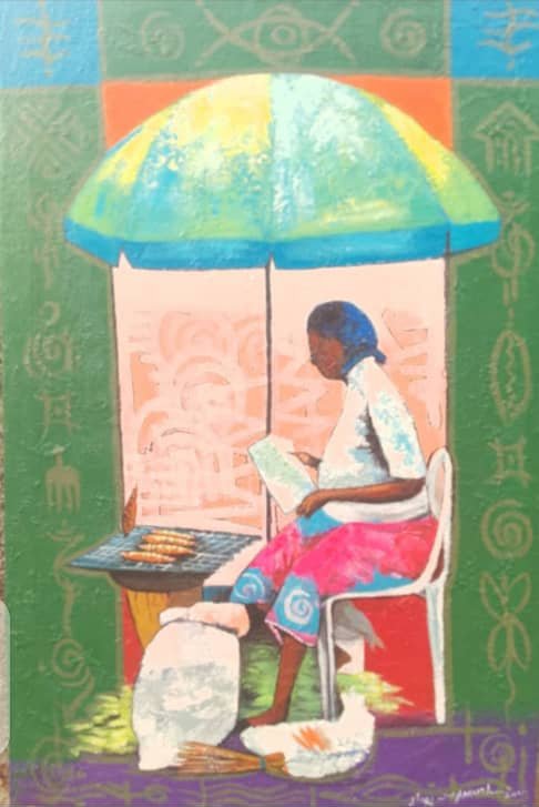 Woman selling under an umbrella