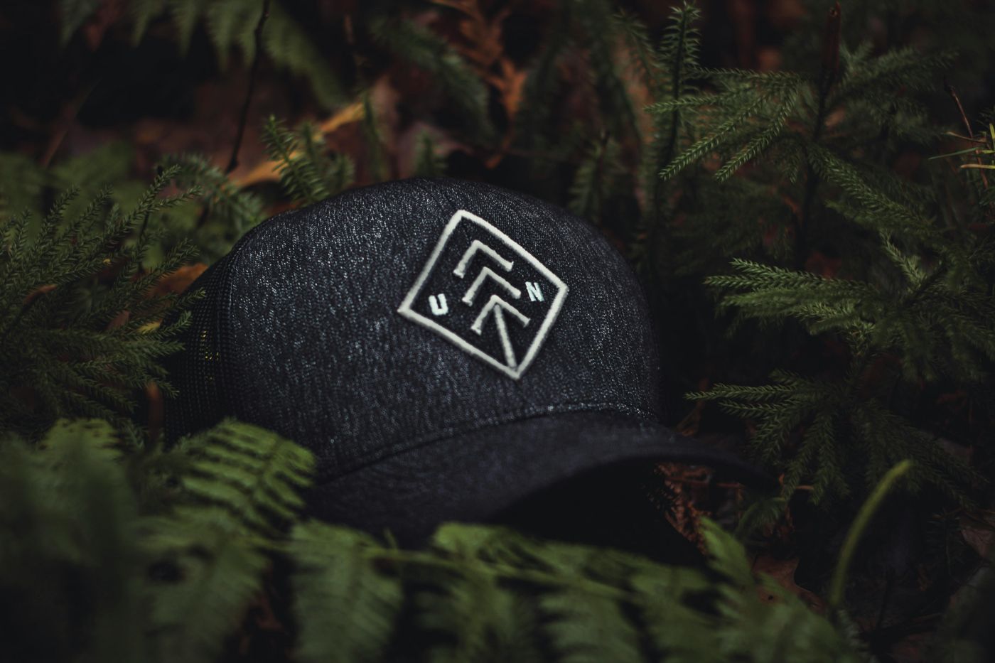 Black cap with a logo