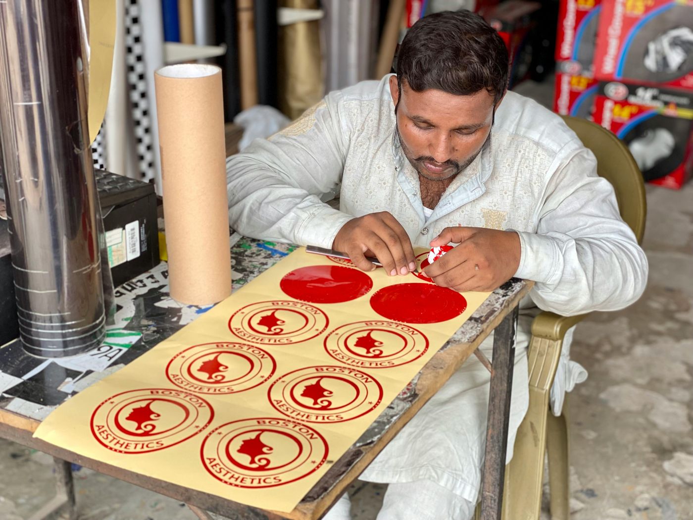 Craftsman preparing printed labels